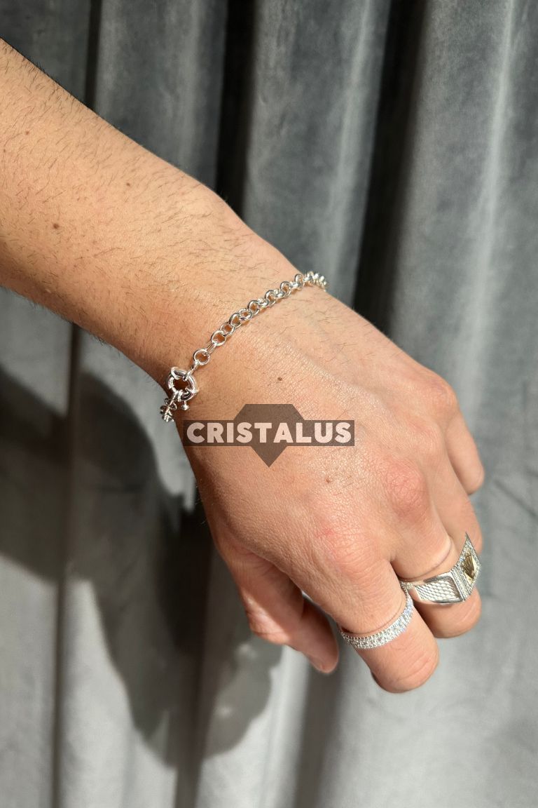 Pulsera rollo con broche timón de plata 925